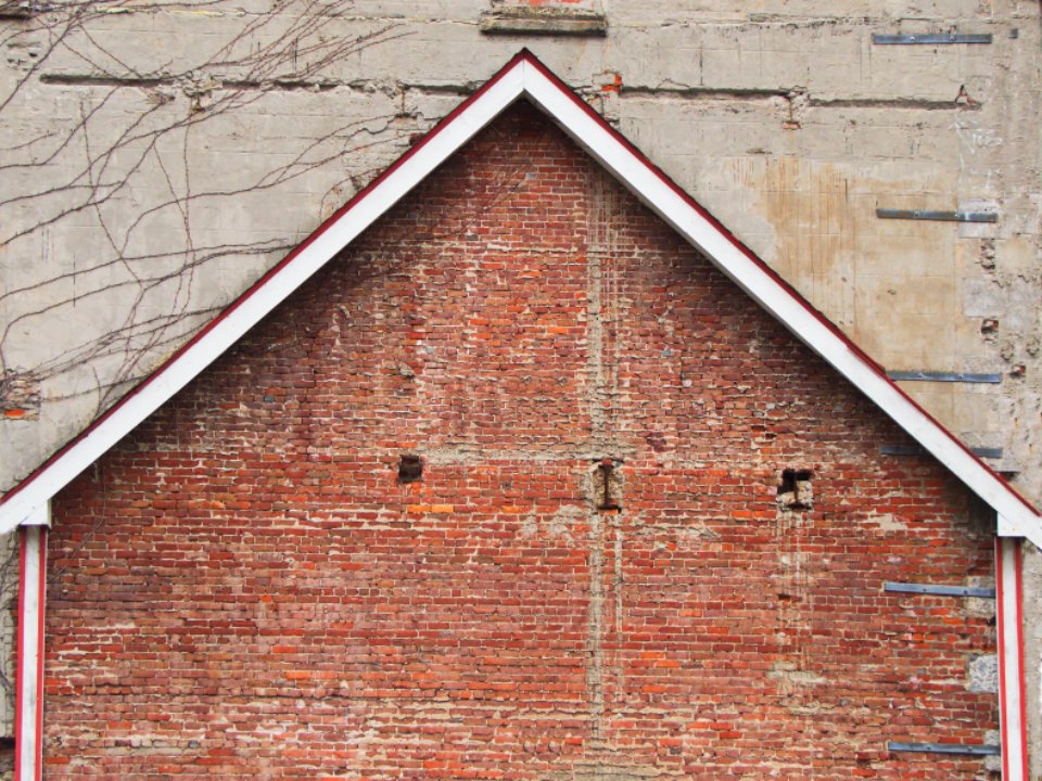 A brick gable end under a pitched roof