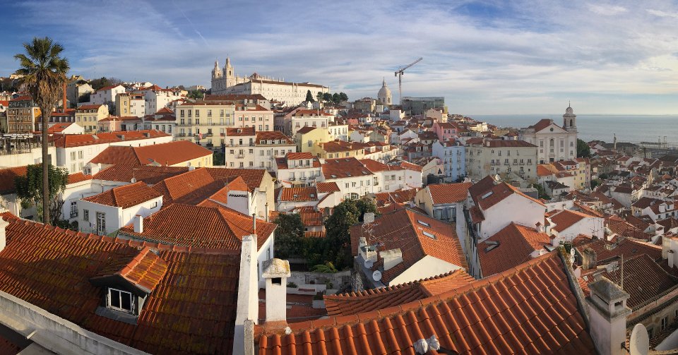 Clay-tiled rooftops across a town